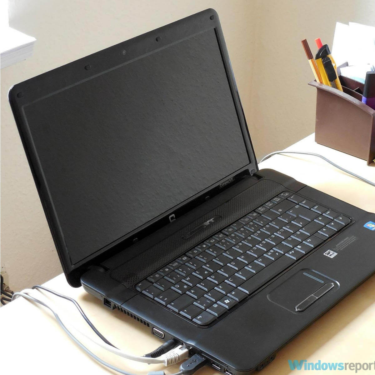 laptop on desk black - How to save a sticker Paint 3D