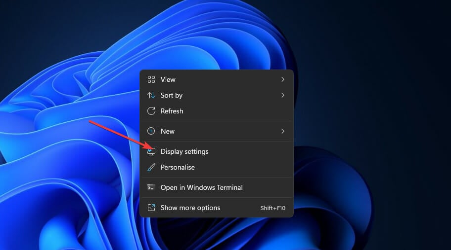 The Display settings option change taskbar size windows 11