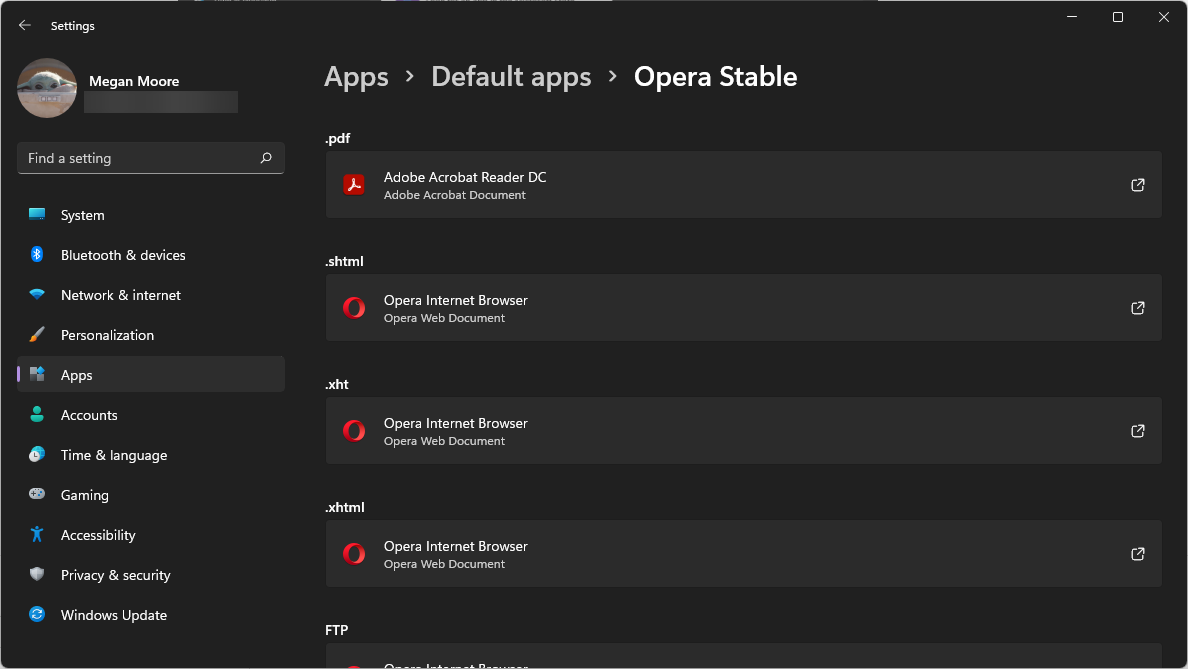 Adjust default apps in Windows 11.
