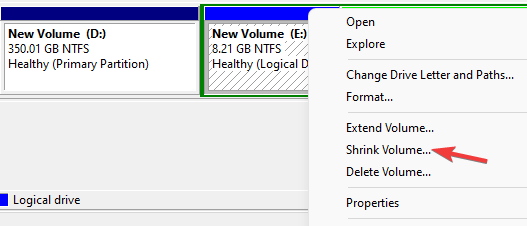 right click on empty partition and select shrink volume