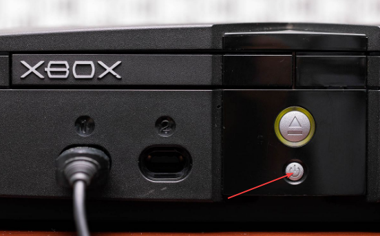 Press Xbox power button