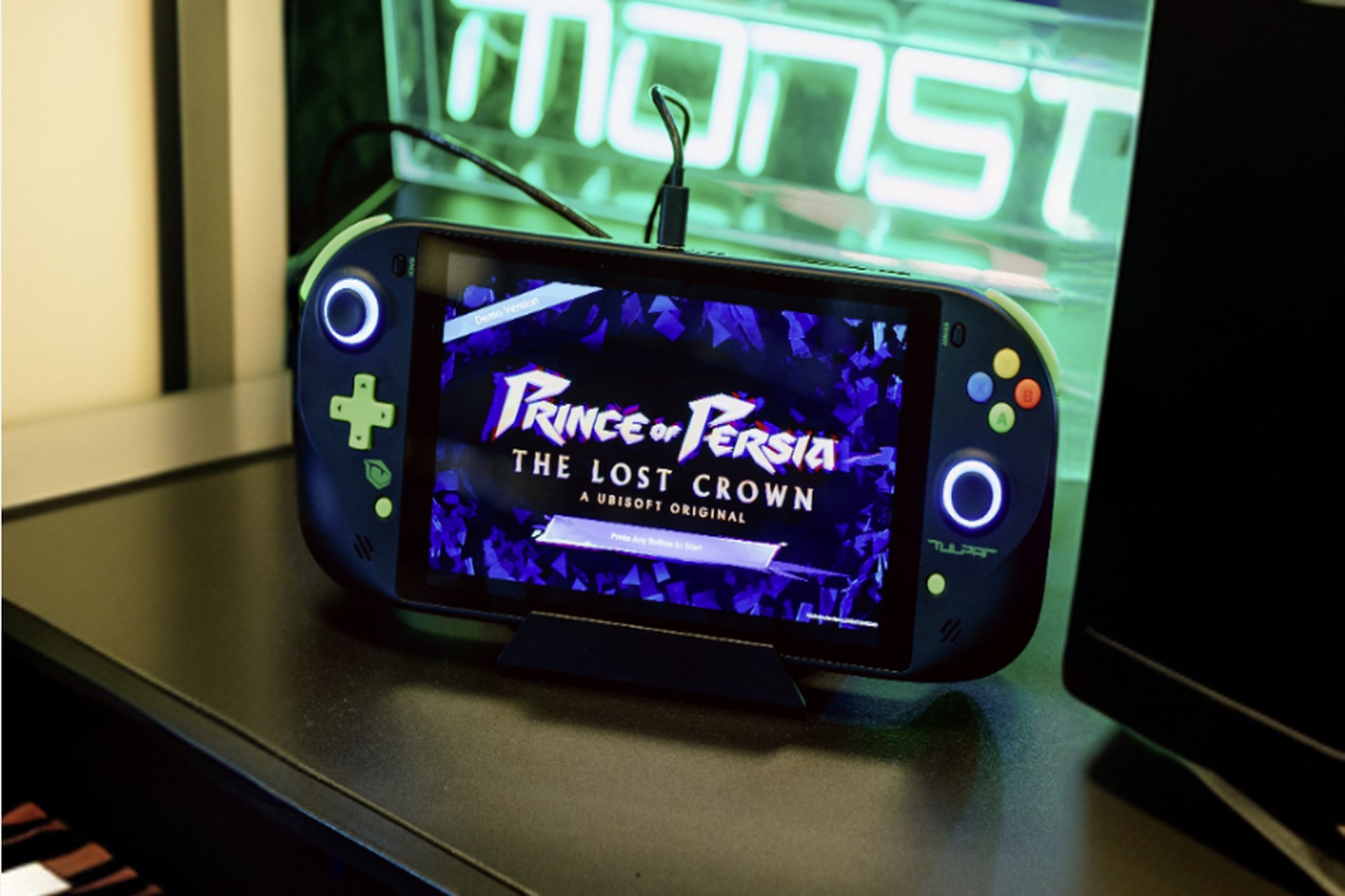 Tulpar Handheld Console featuring Prince of Persia on a Stand